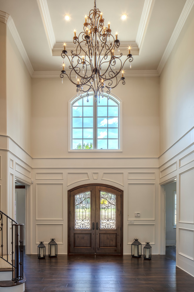 Large foyer in San Francisco with white walls, medium hardwood floors, a double front door, a brown front door and brown floor.