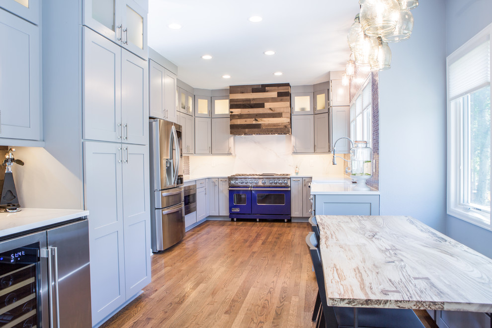 Huge transitional u-shaped eat-in kitchen photo in Denver with shaker cabinets, gray cabinets, quartz countertops, blue backsplash, no island and white countertops
