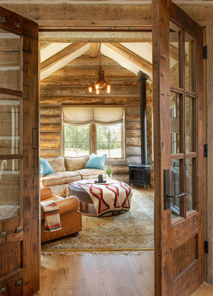 Family room - rustic family room idea in Other