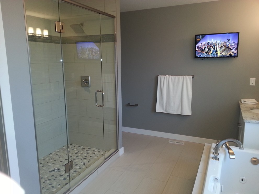 Alcove shower - large transitional master vinyl floor alcove shower idea with shaker cabinets, white cabinets, beige walls, an undermount sink and granite countertops