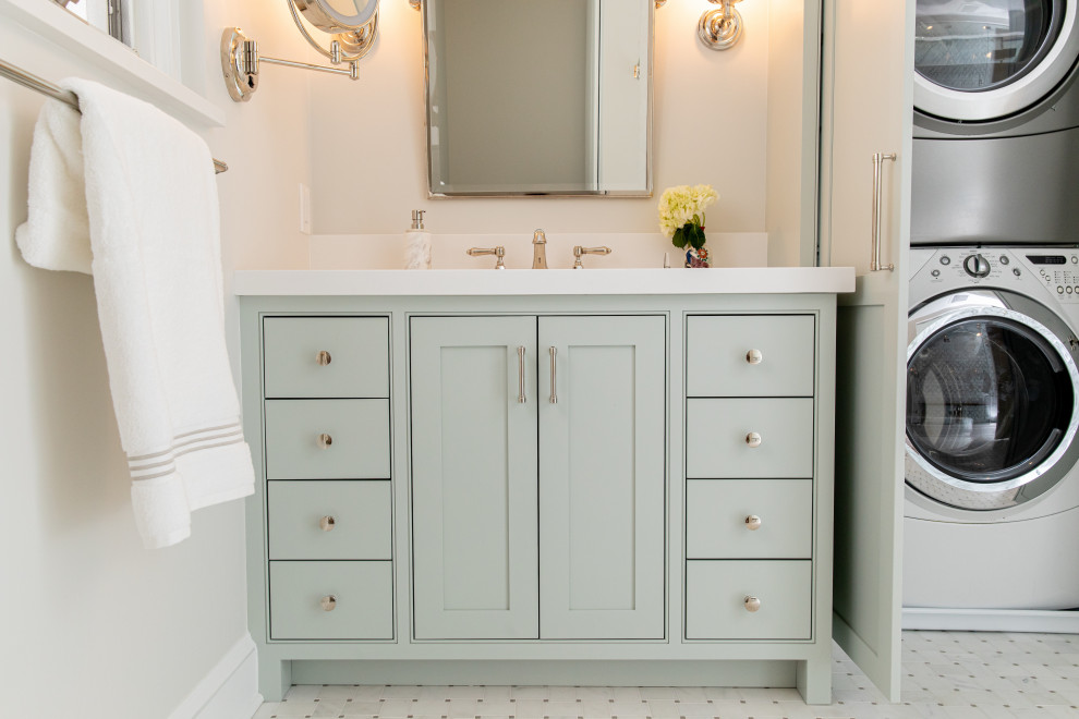 This is an example of a transitional master bathroom in Baltimore with shaker cabinets, multi-coloured tile, a hinged shower door, white benchtops, a shower seat, a double vanity and a built-in vanity.
