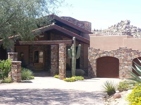 Inspiration for a rustic home design remodel in Phoenix