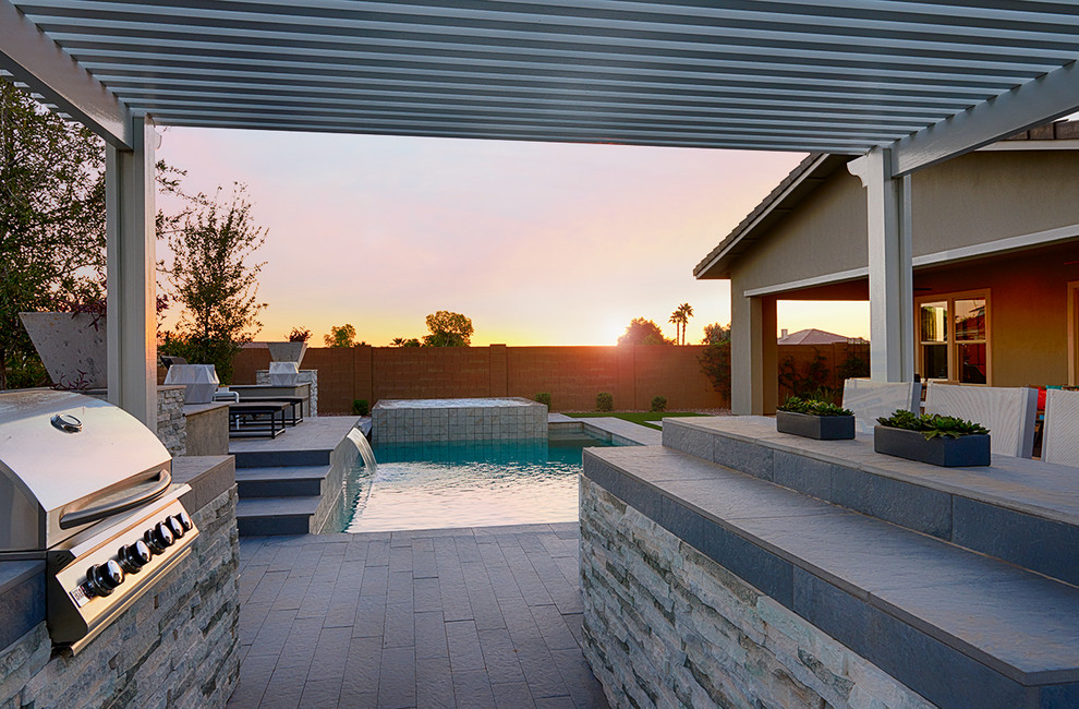 Inspiration for a contemporary backyard pool in Denver.