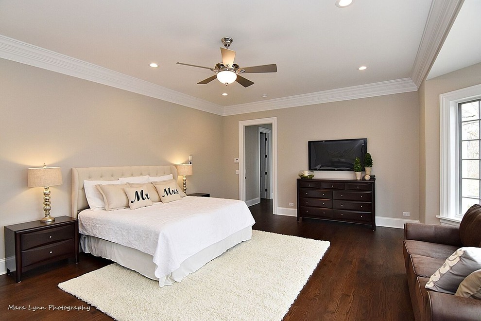 Example of a transitional bedroom design in Chicago
