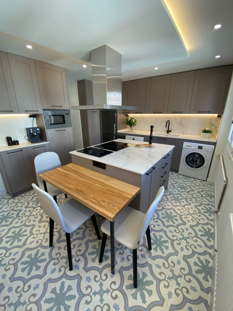 Enclosed kitchen - large transitional u-shaped porcelain tile and multicolored floor enclosed kitchen idea in Other with an undermount sink, beaded inset cabinets, pink cabinets, marble countertops, white backsplash, marble backsplash, colored appliances, two islands and white countertops