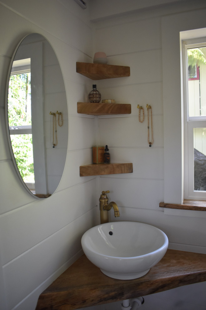 Photo of a small shower room bathroom in Hawaii with open cabinets, a japanese bath, white tiles, a vessel sink, wooden worktops, brown worktops, a single sink, a floating vanity unit, exposed beams and tongue and groove walls.