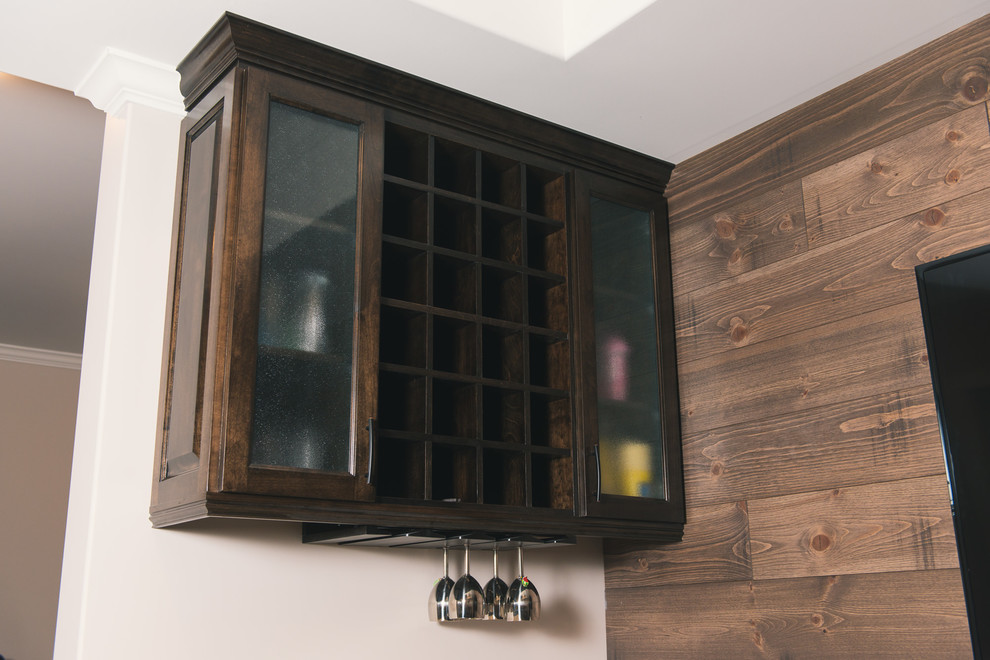 Inspiration for a rustic single-wall home design remodel with dark wood cabinets