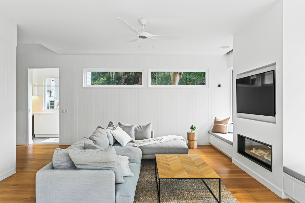 Photo of a beach style family room in Sydney.