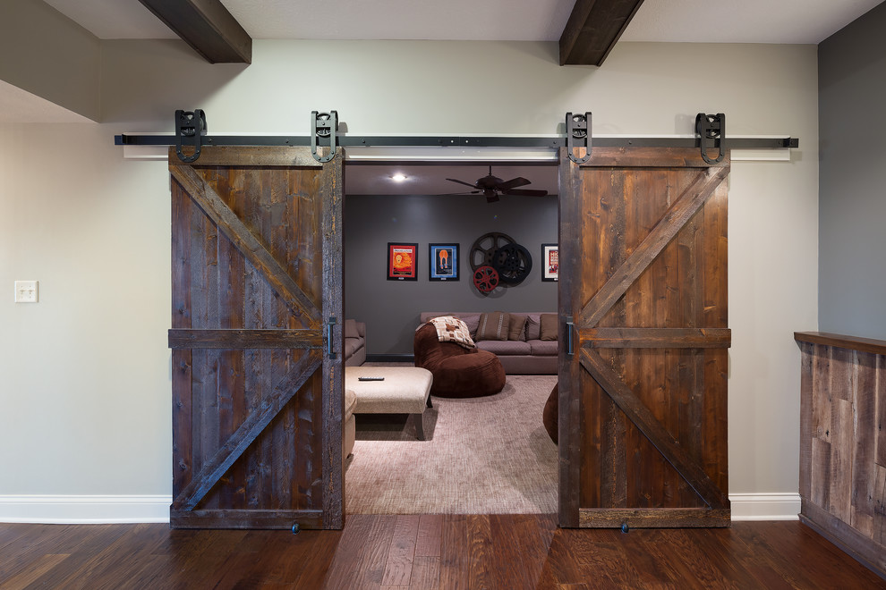 Basement - large rustic look-out medium tone wood floor basement idea in Indianapolis with gray walls