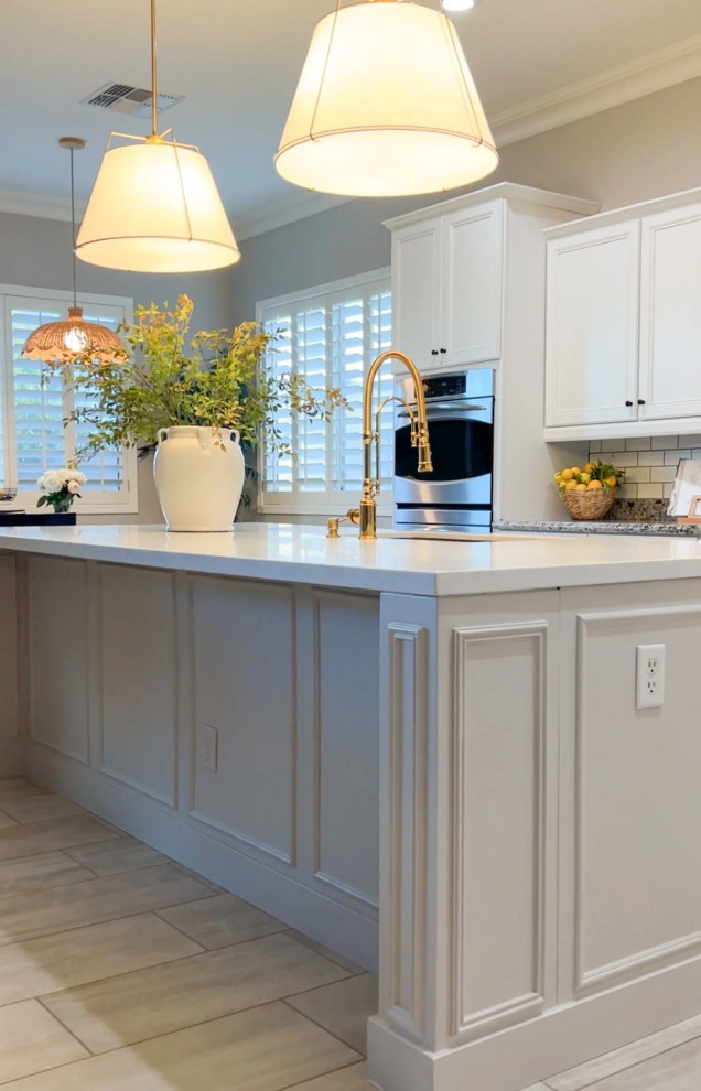 Example of a transitional kitchen design in Phoenix