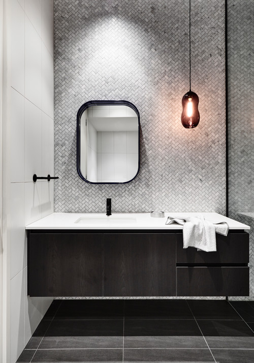 Contemporary Vanity: Black Wood Cabinet Fronts with White Quartz Countertops