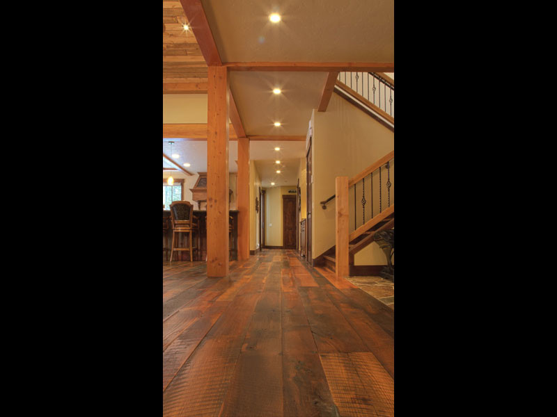Example of a mountain style home design design in Denver