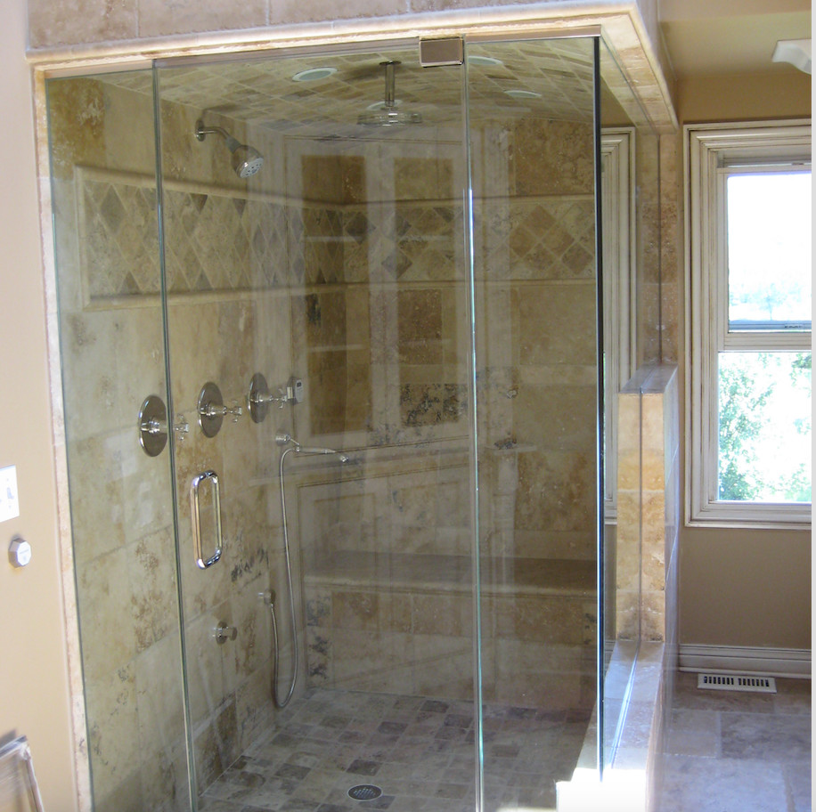Corner shower - mid-sized transitional 3/4 beige tile and ceramic tile corner shower idea in Chicago with brown walls