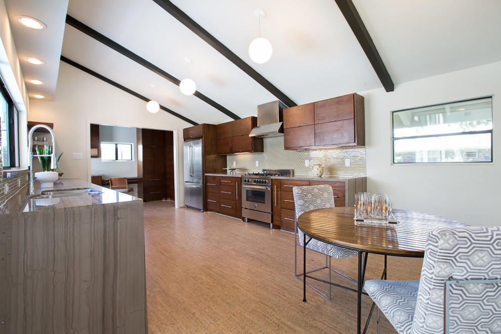 Design ideas for a mid-sized midcentury galley eat-in kitchen in Denver with an undermount sink, flat-panel cabinets, medium wood cabinets, quartzite benchtops, green splashback, glass tile splashback, stainless steel appliances, cork floors and no island.