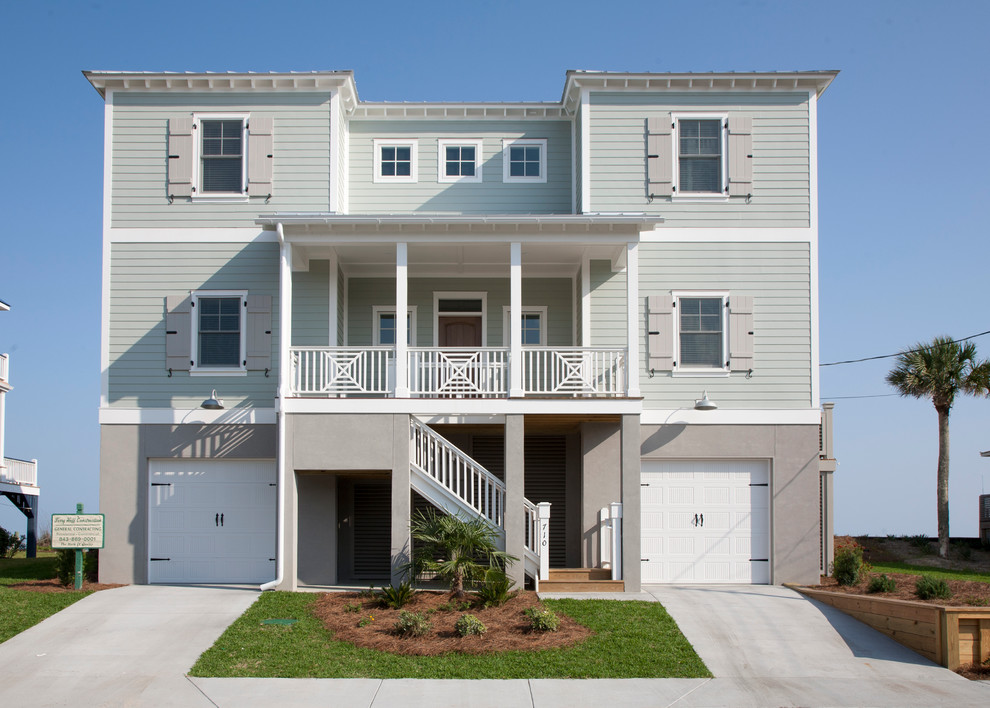 Inspiration for a large beach style three-storey grey exterior in Charleston with concrete fiberboard siding.