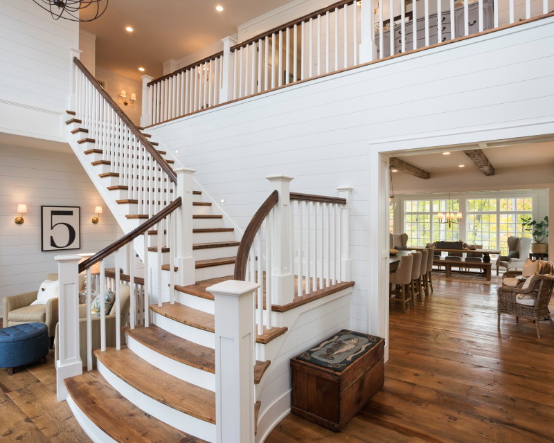 Design ideas for an eclectic wood l-shaped staircase with wood railing and painted wood risers.