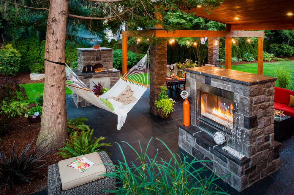Design ideas for a contemporary patio in Portland with a fire feature.