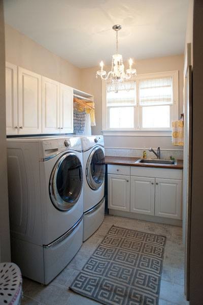 Example of a transitional laundry room design in Atlanta