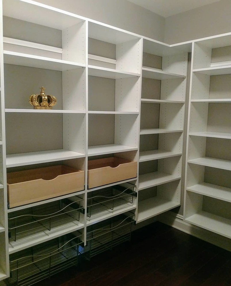 Mid-sized modern u-shaped kitchen pantry in New York with white cabinets.