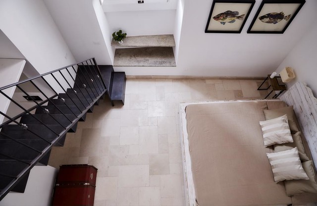 Palazzotto in Puglia shabby-chic-style-bedroom