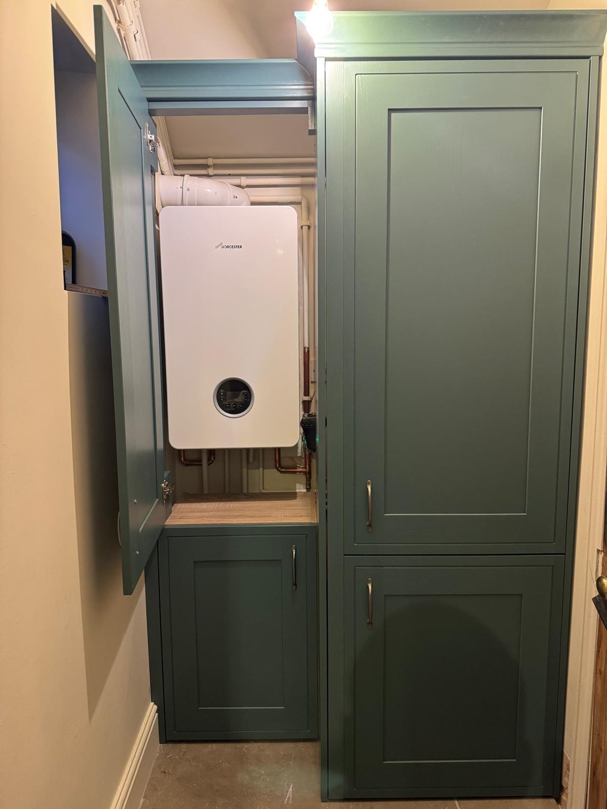 A Dark Coloured Gally Kitchen