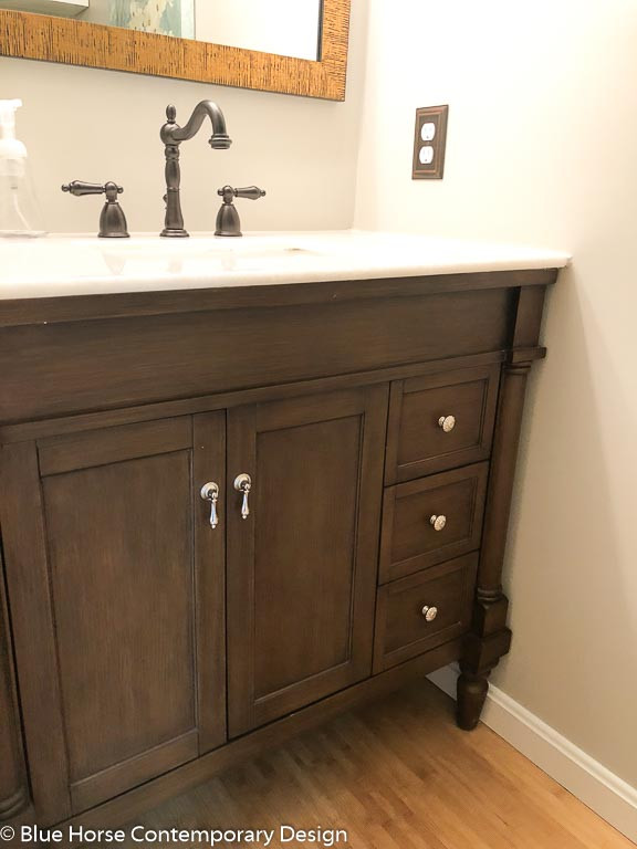 Design ideas for a small transitional powder room in DC Metro with dark wood cabinets, grey walls, bamboo floors, an undermount sink, marble benchtops, brown floor, white benchtops and a freestanding vanity.
