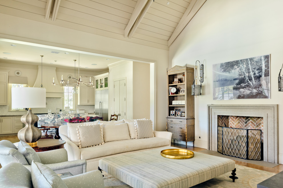 Living room - mid-sized traditional open concept light wood floor, brown floor and shiplap ceiling living room idea in Dallas with white walls, a standard fireplace, a wood fireplace surround and a tv stand