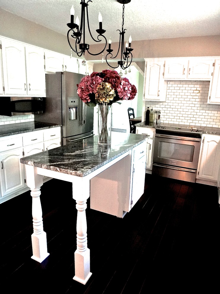 Example of a mid-century modern kitchen design in Minneapolis