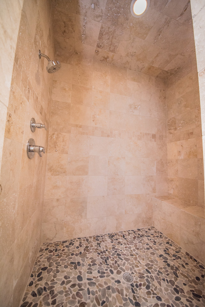 Large arts and crafts master bathroom in Austin with stone tile, shaker cabinets, white cabinets, a freestanding tub, an alcove shower, beige walls, concrete floors, an undermount sink and granite benchtops.