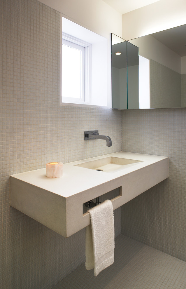 Photo of a small modern 3/4 bathroom in Los Angeles with mosaic tile floors, an integrated sink, concrete benchtops, an open shower, a one-piece toilet, white tile, mosaic tile and white walls.