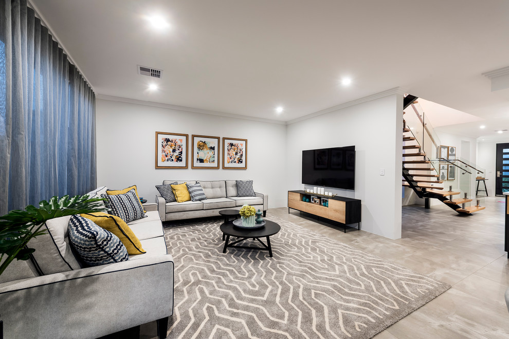 Photo of a large transitional open concept living room in Perth with white walls, porcelain floors and a wall-mounted tv.