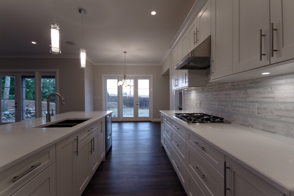 Example of a transitional kitchen design in Vancouver