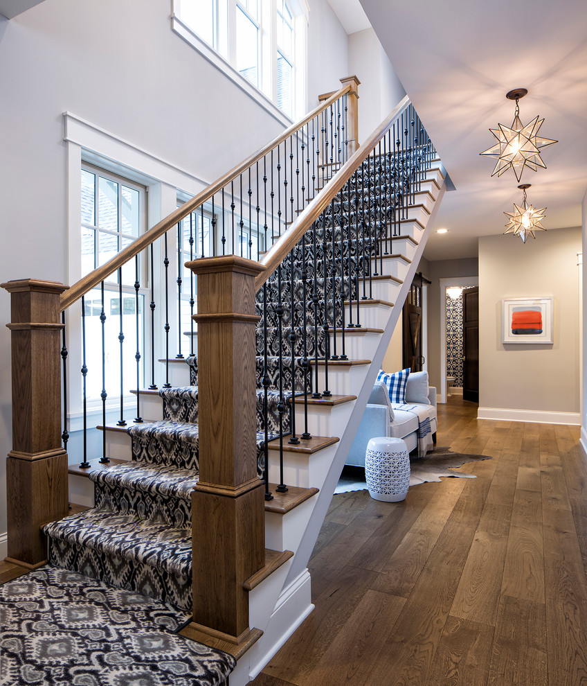 Photo of a large transitional staircase in Minneapolis.