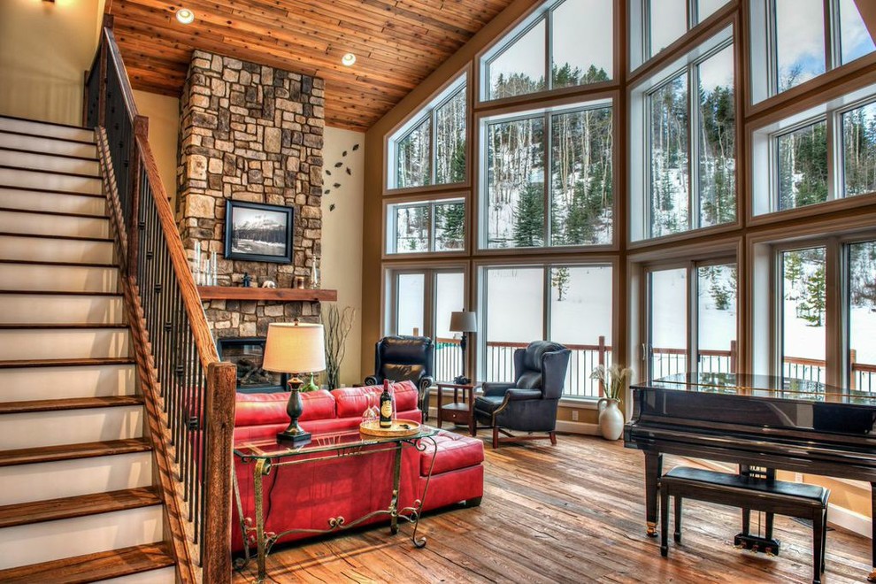 Example of a mountain style home design design in Calgary