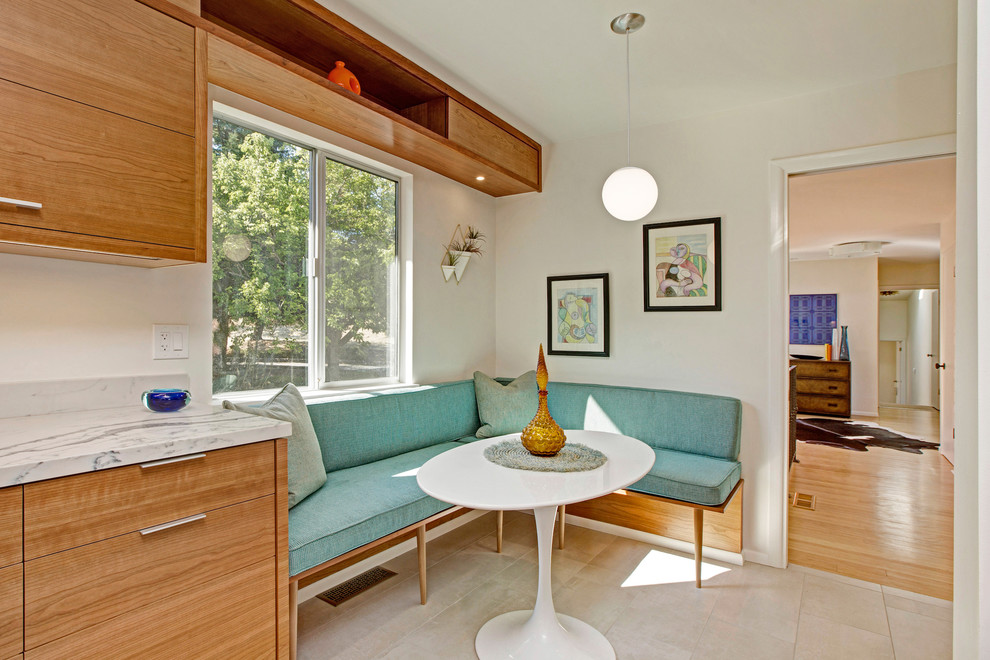 Design ideas for a mid-sized midcentury open plan kitchen in San Francisco with an undermount sink, flat-panel cabinets, medium wood cabinets, quartzite benchtops, white splashback, ceramic splashback, stainless steel appliances, ceramic floors, with island and beige floor.