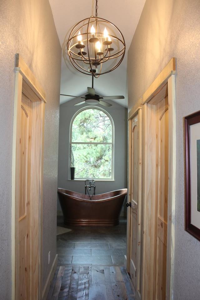 Hallway - rustic hallway idea in Denver