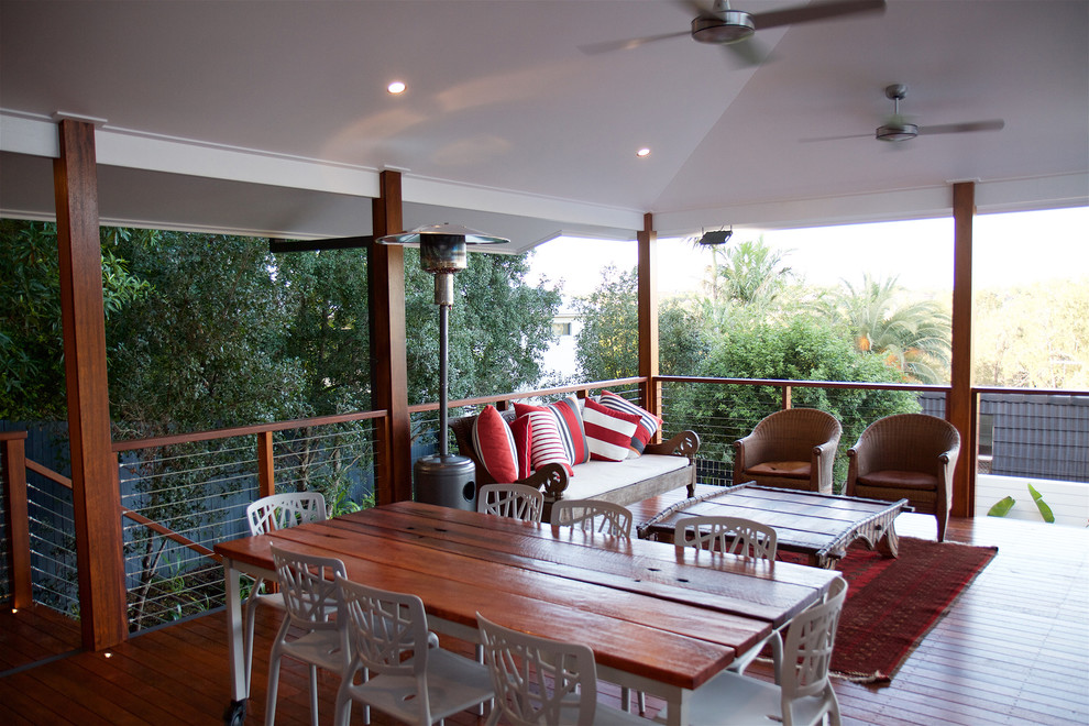 Inspiration for a large contemporary deck in Brisbane with a roof extension.