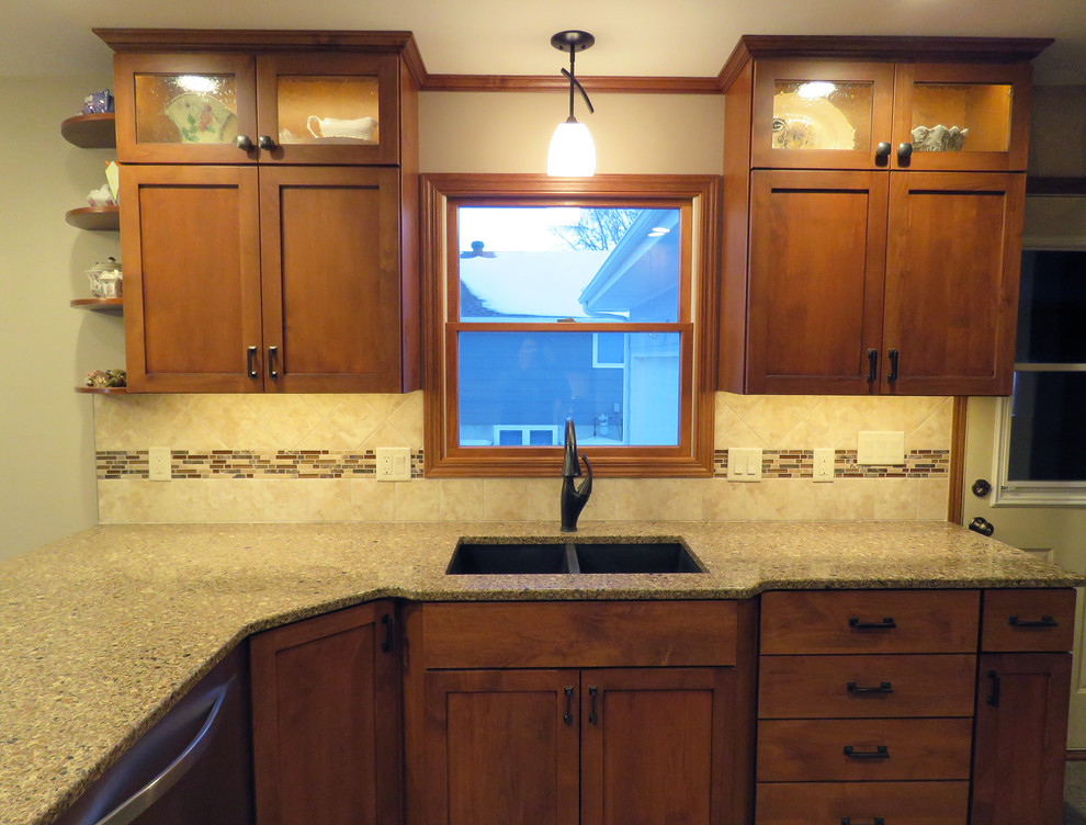Mid-sized transitional u-shaped vinyl floor open concept kitchen photo with cement tile backsplash, a double-bowl sink, shaker cabinets, dark wood cabinets, quartz countertops, beige backsplash, stainless steel appliances and a peninsula