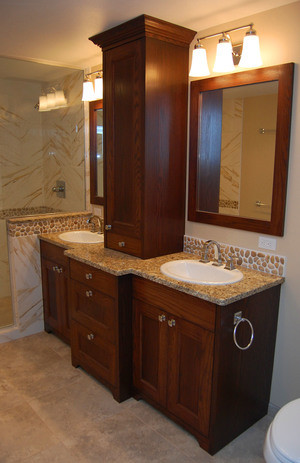 Mid-sized transitional master beige tile, brown tile, multicolored tile and stone tile ceramic tile alcove shower photo in Seattle with recessed-panel cabinets, dark wood cabinets, white walls, a drop-in sink, granite countertops and a one-piece toilet