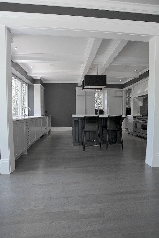 This is an example of a contemporary kitchen in Atlanta with grey floor.