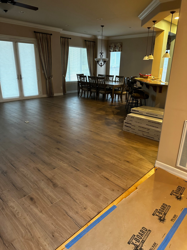 ADA Bathroom/Garage Retrofit and New Flooring