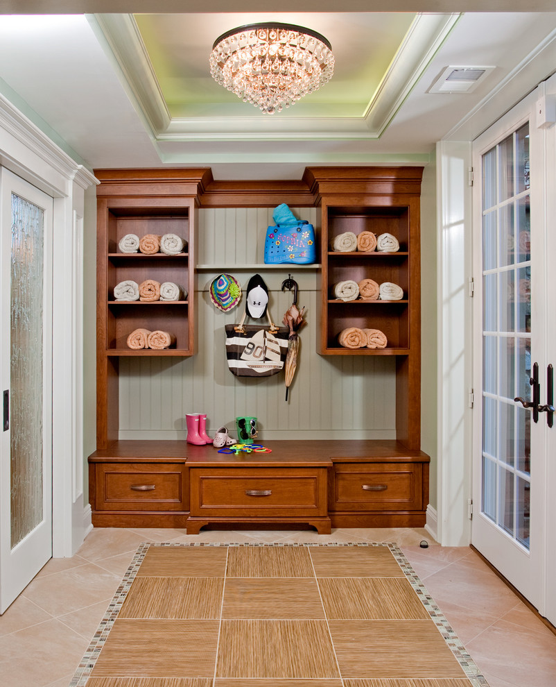 Photo of a traditional mudroom in Philadelphia with green walls.