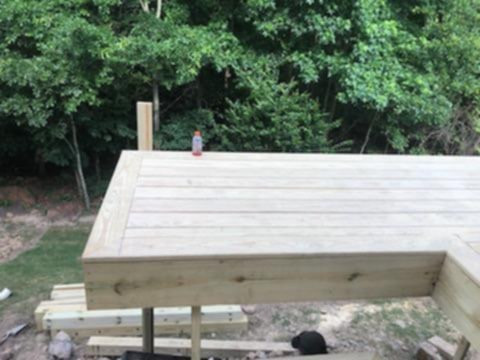 Example of a mountain style deck design in Raleigh