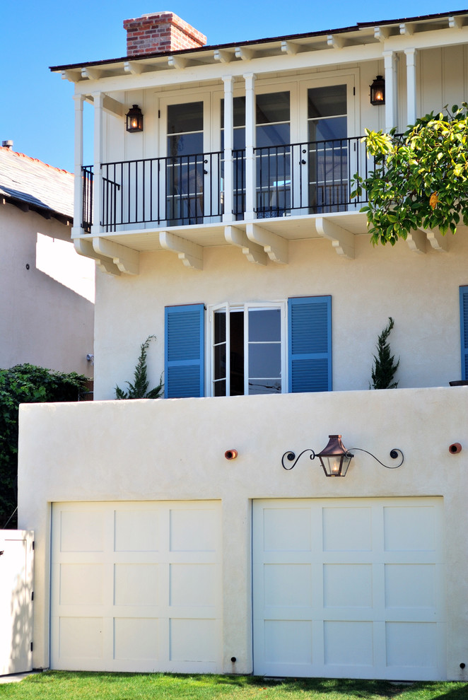 Traditional three-storey stucco yellow exterior in San Diego.