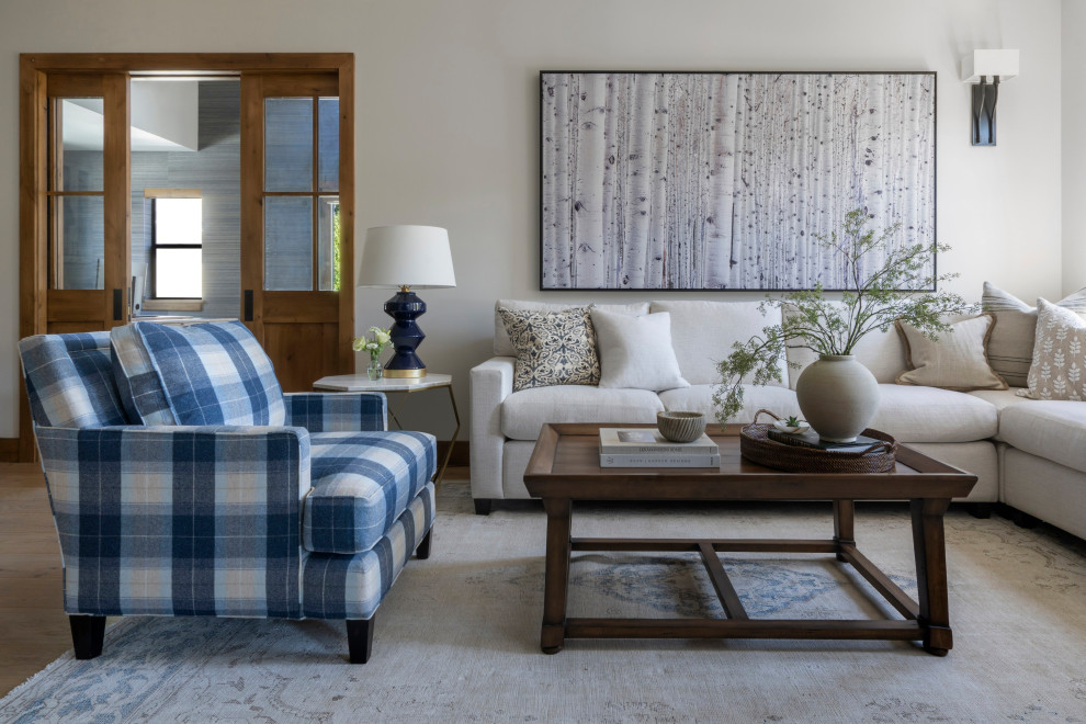 Inspiration for a transitional open concept medium tone wood floor and brown floor living room remodel in San Francisco with gray walls