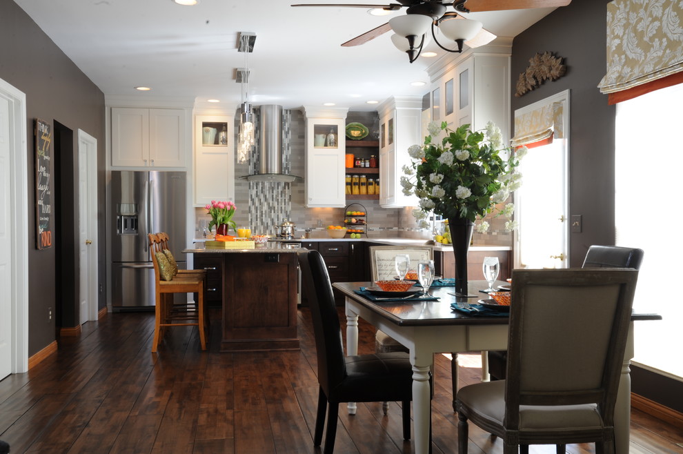 Mid-sized transitional l-shaped dark wood floor eat-in kitchen photo in Cincinnati with an undermount sink, shaker cabinets, quartz countertops, gray backsplash, stainless steel appliances, an island and subway tile backsplash