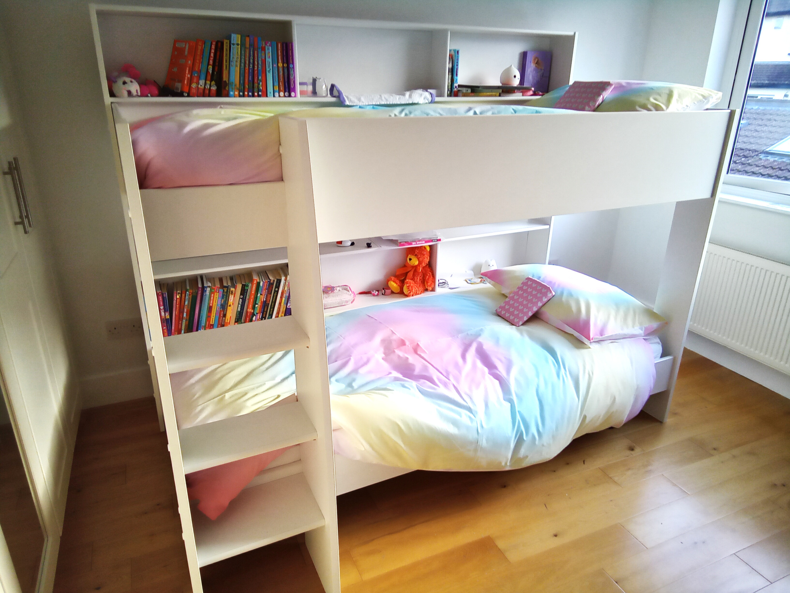 Girls Bedroom Storage with incorporated Desk