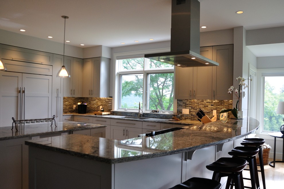 Transitional kitchen in Burlington with recessed-panel cabinets, grey cabinets, granite benchtops, stainless steel appliances and with island.