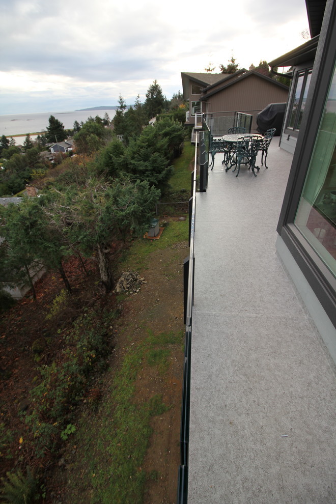 Deck - large modern backyard deck idea