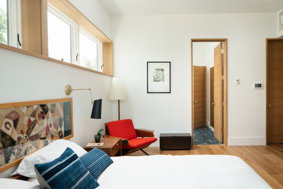 This is an example of a midcentury bedroom in Denver.